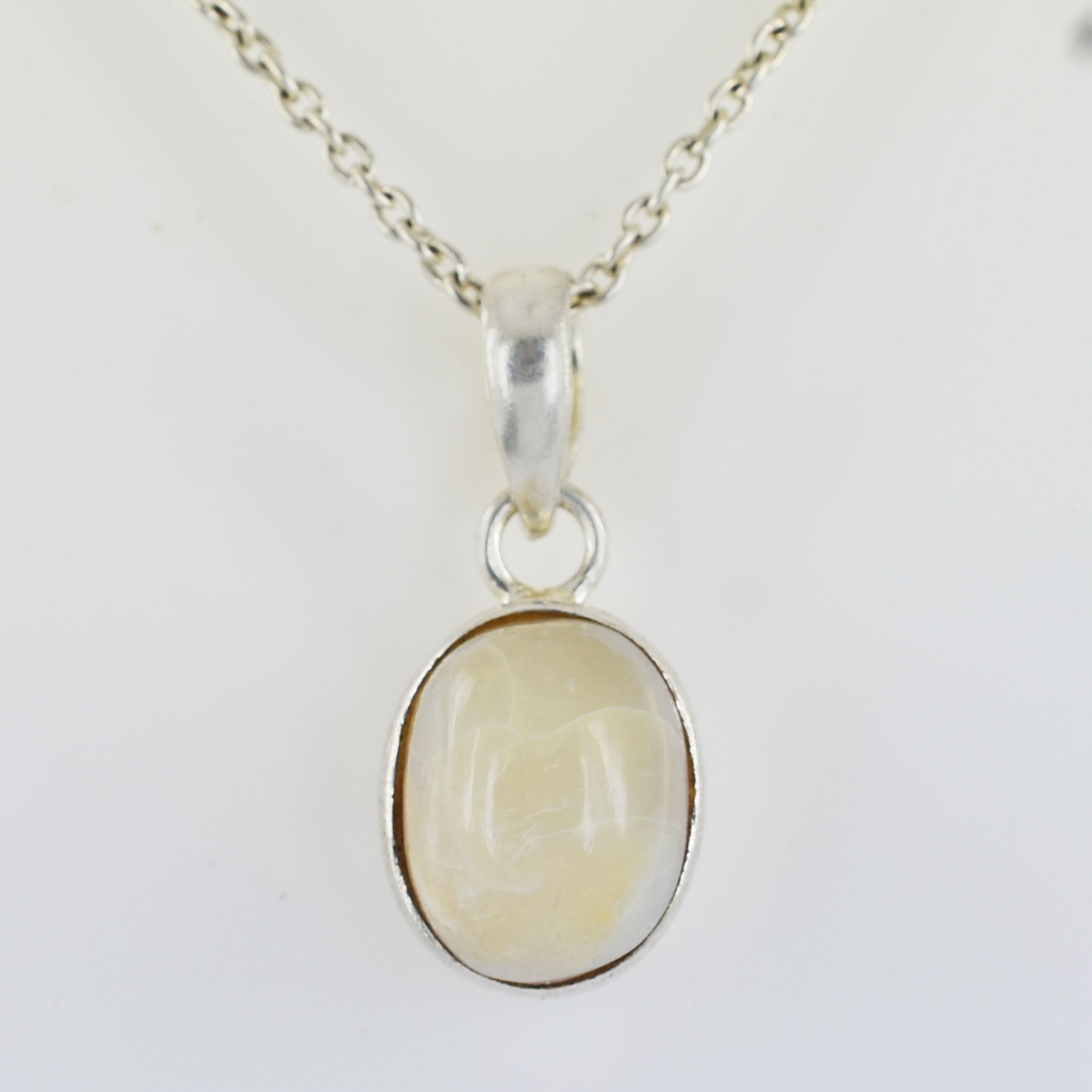 Natural Opal Gemstone Pendant in Silver-Plated Setting