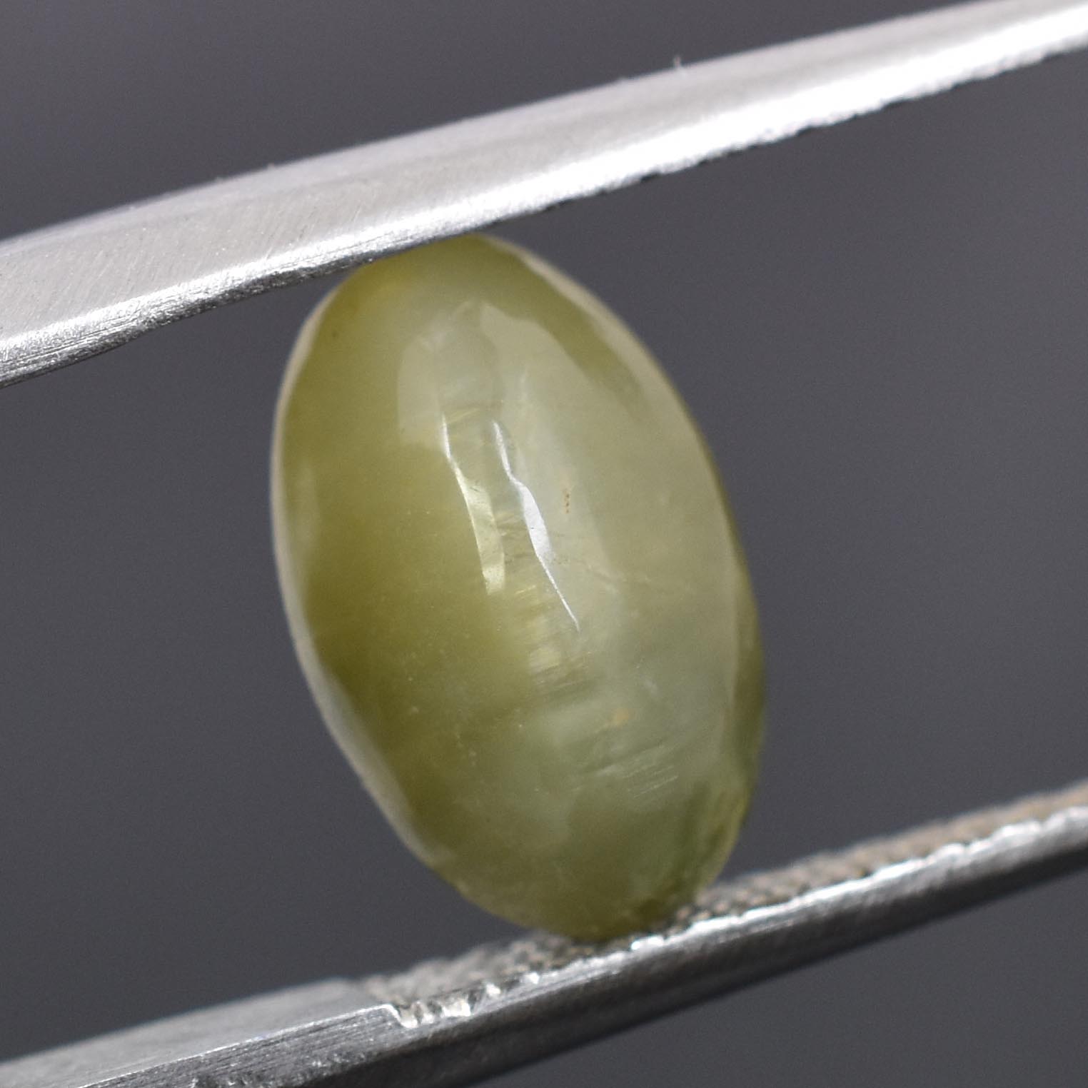 Certified Natural Cat's Eye Quartz – 2.76 Carat Oval Cabochon Gemstone
