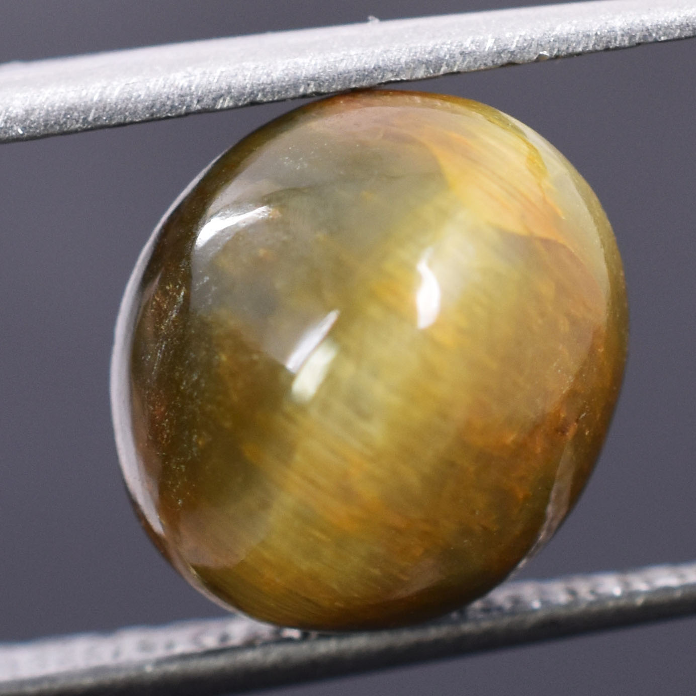 Certified Natural Cat's Eye Quartz – 4.59 Carat Oval Cabochon Gemstone
