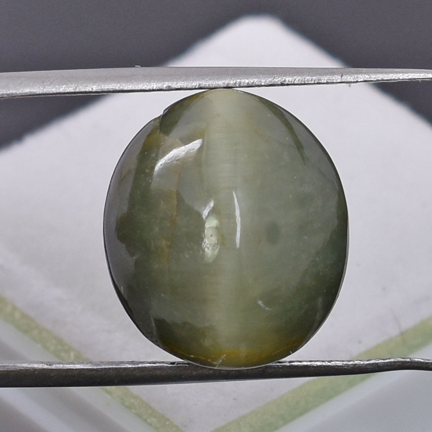 Certified Natural Cat's Eye Quartz – 10.65 Carat Oval Cabochon Gemstone - Image 4